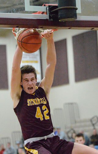 Will Tschetter scores two of his game-high 30 points with this slam dunk against Triton.