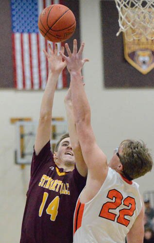 Eli Klavetter goes up and over a Lake City defender for a floating jumper in the lane.