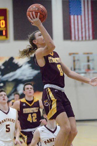 Nolan Stier takes it to the rim on an this fast break bucket.