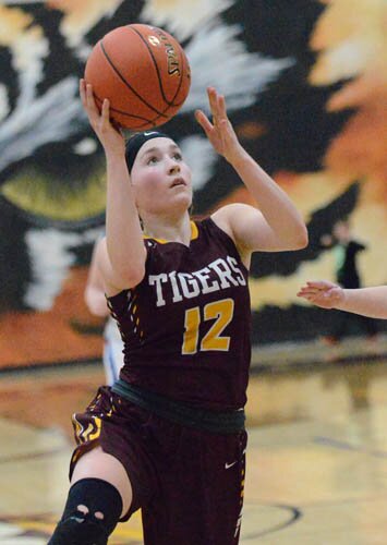 Lily Welch connects on a running jumper.
