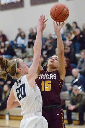 Maia Peterson stops and pops a baseline jumper.