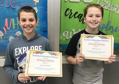 Fifth graders Aaron Boland, left, and Ella Minnich.