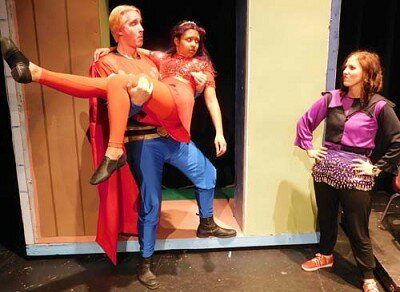 Flash (Dave Stepan) left, rescues Aura (Izzy Maxwell) center, from the dungeon, but his fiance, Dale, misunderstands during a dress rehearsal for the upcoming Stewartville Community Theatre production of Flash Gordon The Musical, to be presented at the Stewartville High School Performing Arts Center on Friday, March 6 and Saturday, March 7 at 7:30 p.m. each evening, and on Sunday, March 8 at 2 p.m. Stewartville Community Theatre is beginning its 25th year, said Aaron Rocklyn, the plays director. It has been 25 years now, and weve never done science fiction, Rocklyn said. This is the start of our 25th year. Where does the time go?
