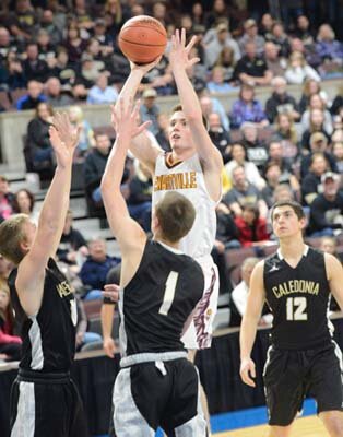 Bradon Holschlag pops a mid-range jumper for two of his seven points against Caledonia.