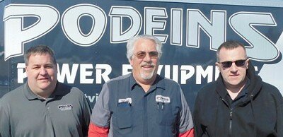 From left, Ryan Podein, Mark Podein and Josh Podein, all of whom work at Podeinís Power Equipment, have paid the DownUnder Bar to provide free meals for health care workers, EMTs, firefighters and law enforcement personnel. Mike Podein, also of Podeinís Power Equipment, is not pictured.
