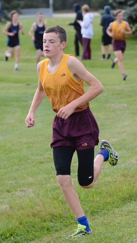 Josh Langseth increases his lead coming out of a corner on the 5K course.