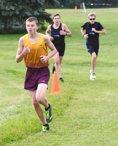 Jackson Yetter pulls away from a pair of runners from KM.