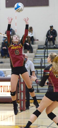 Tiger setter Jaidyn Brower makes a leaping assist at the net in a match against ZM earlier this season. Brower eclipsed the 2,000 career set assist milestone in a match at Triton on Nov. 7. She needs 119 more to set the SHS record.
