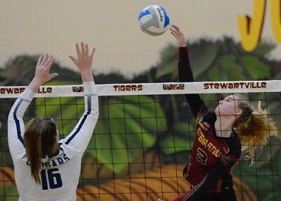 Tiger hitter Allie Elliott (#3) pounds this crosscourt kill during a recent match against ZM.