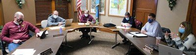 Karla Strain, city finance director, far right, reviews a PowerPoint presentation with the Stewartville City Council at the citys annual truth in taxation meeting at Stewartville City Hall on Tuesday evening, Dec. 8. The citys total budget is $8,604,870 for 2021, a 1.994 percent increase from its 2020 budget, Strain said. Our budget increase is less than 2 percent, which is less than we even did for last year, she said. City Council members, from left, include Josh Arndt, Brent Beyer, Mayor Jimmie-John King, Craig Anderson and Jeremiah Oeltjen.