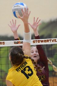 Allie Elliott goes up to block this Byron attack at the net during Stewies 3-2 win in the semifinal match of the Section 1AAA playoffs.