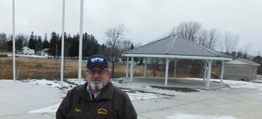 Roger Peterson, commander of the Stewartville Veterans of Foreign Wars (VFW) Post 8980 for six years, stands near the restroom and octagon picnic shelter that will be part of the VFW�s Veterans Memorial Park near Stewartville�s south entrance. �We�re doing this to thank our veterans for their serivce to our country,� he said.
