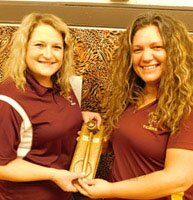 Nichol O�Neill, left, incoming chair of the Stewartville School Board, accepts the gavel from Rebecca Wortman, who served as Board chair in 2020 and 2021. �I am thankful for the nomination (as chair) and the confidence the Board has placed in me,� O�Neill said.